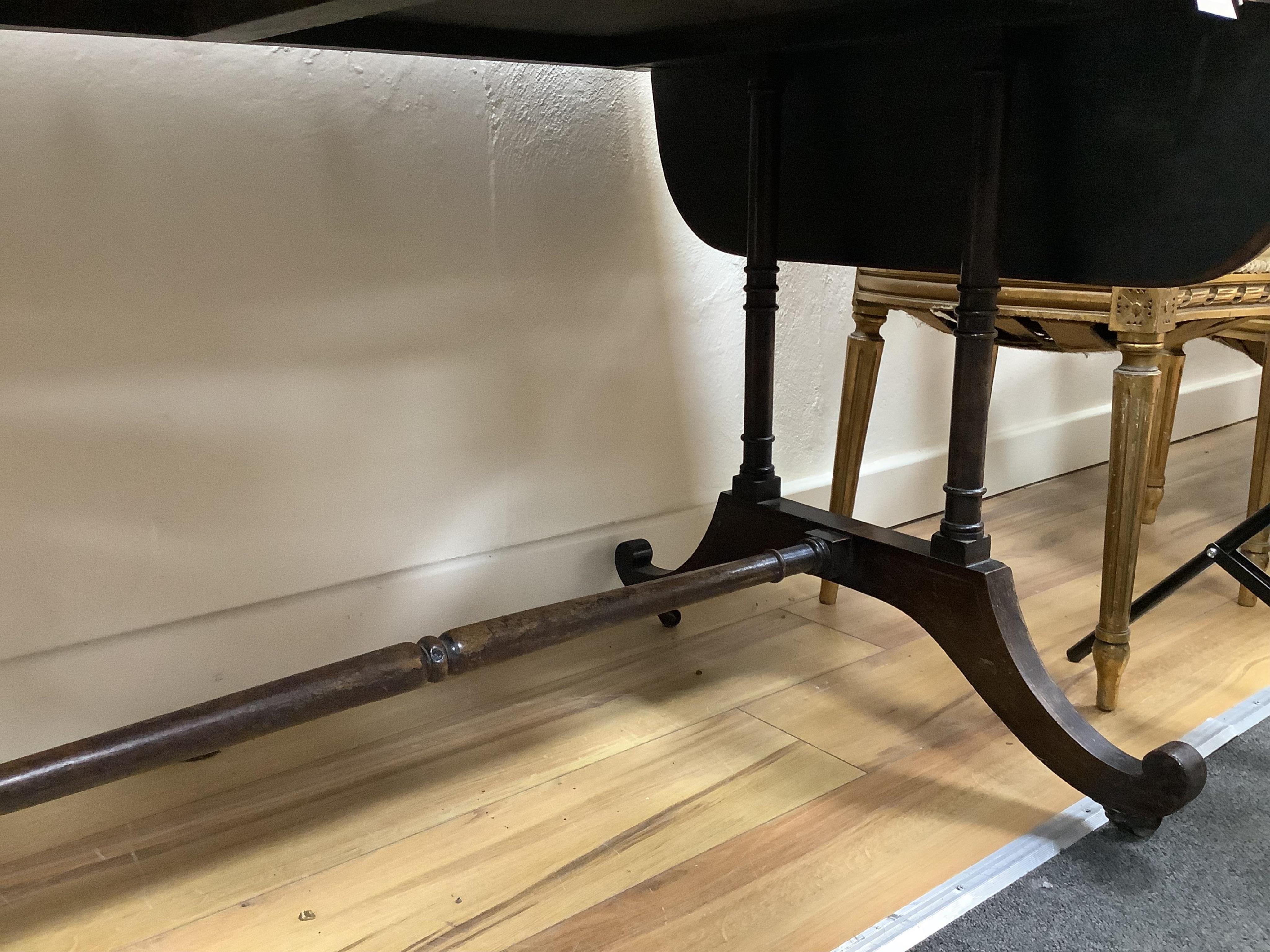 A Regency satinwood banded rosewood sofa table, width 92cm, depth 66cm, height 71cm. Condition - fair